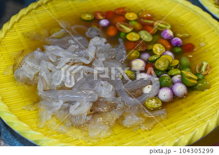 Vietnamese dish Jellyfish tentacles in sauce with vegetables Vietnamese dish Jellyfish tentacles in sauce with vegetables 104305299