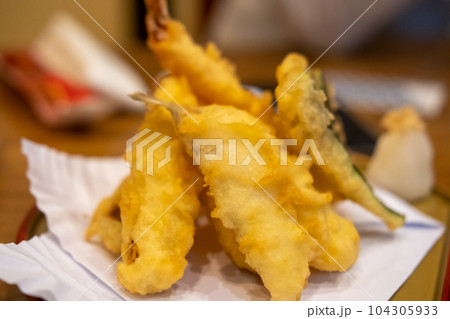 Set of shrimp tempura served on plate on the table Set of shrimp tempura served on plate on the table 104305933