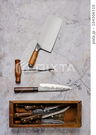 Composition with used butcher tools 104306510