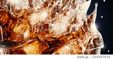 Cola with Ice. Close up of the ice cubes in cola water. Texture of carbonate drink with bubbles in glass. Cola soda and ice splashing fizzing or floating up to top of surface. Cold drink background. Cola with Ice. Close up of the ice cubes in cola water. Texture of carbonate drink with bubbles in glass. Cola soda and ice splashing fizzing or floating up to top of surface. Cold drink background. 104307910