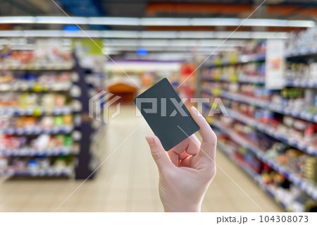 Concepts of buying in a store with a plastic card. Concepts of buying in a store with a plastic card. 104308073