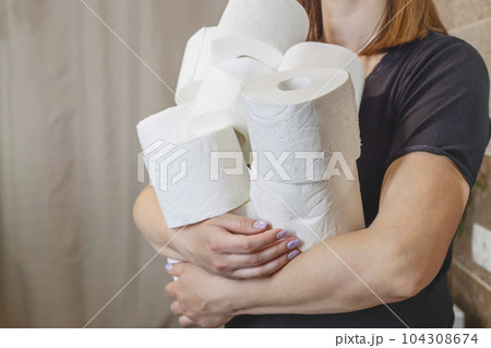 People are stocking up toilet paper for home quarantine from coronavirus People are stocking up toilet paper for home quarantine from coronavirus 104308674
