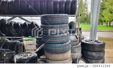 Landfill with old tires and tires for recycling. Disposal of used tires. Worn wheels for recycling. Landfill with old tires and tires for recycling. Disposal of used tires. Worn wheels for recycling. 104311104