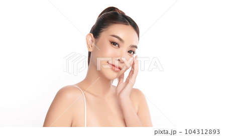 Beautiful young asian woman with clean fresh skin on white background, Face care, Facial treatment, Cosmetology, beauty and spa, Asian women portrait. Beautiful young asian woman with clean fresh skin on white background, Face care, Facial treatment, Cosmetology, beauty and spa, Asian women portrait. 104312893