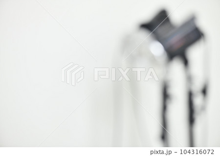 a dim light fixture against a white background 104316072