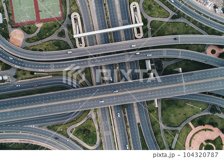 Aerial view city junction transport road with vehicle 104320787