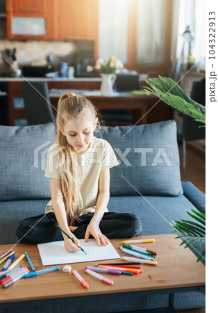 Child girl drawing with colorful pencils Child girl drawing with colorful pencils 104322913