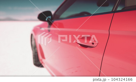 lonely sport car in salt desert 104324166