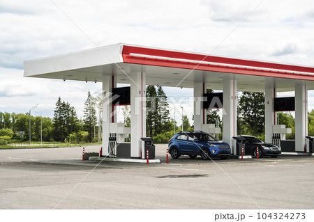 Petrol filling station on the highway. Fuel, price, petrol cars concept. Petrol filling station on the highway. Fuel, price, petrol cars concept. 104324273