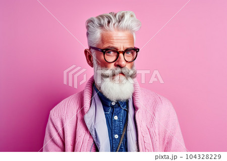 Studio shot of handsome senior man hipster dressed in stylish coat and sunglasses. Isolated on pink background 104328229