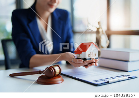 Law, Consultation, Agreement, Contract, Concept Attorney or Lawyer is sitting and accepting complaints from clients for home and land matters in court Law, Consultation, Agreement, Contract, Concept Attorney or Lawyer is sitting and accepting complaints from clients for home and land matters in court 104329357