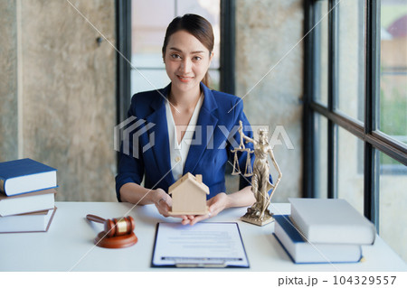 Law, Consultation, Agreement, Contract, Concept Attorney or Lawyer is sitting and accepting complaints from clients for home and land matters in court 104329557