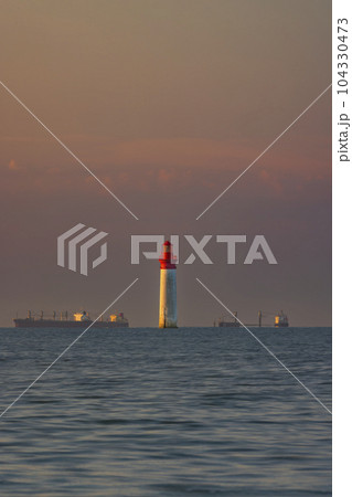 Phare de Chauvea near Ile de Re with ships to La Rochelle, Pays de la Loire, France Phare de Chauvea near Ile de Re with ships to La Rochelle, Pays de la Loire, France 104330473