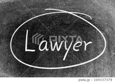 White chalk hand writing in word lawyer and circle shape on blackboard background White chalk hand writing in word lawyer and circle shape on blackboard background 104337379