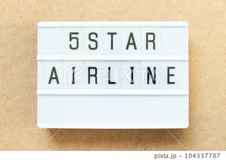 Lightbox with word 5 star airline on wood background Lightbox with word 5 star airline on wood background 104337787