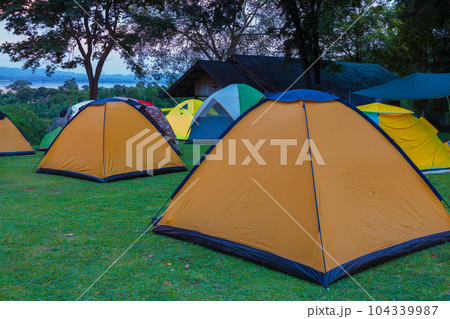 Tents for tourists, outdoors Tents for tourists, outdoors 104339987