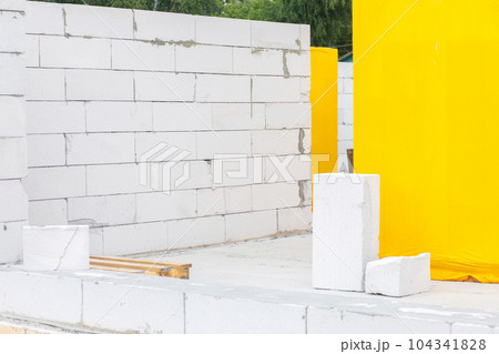 Construction site from a gas block on a concrete floor. 104341828