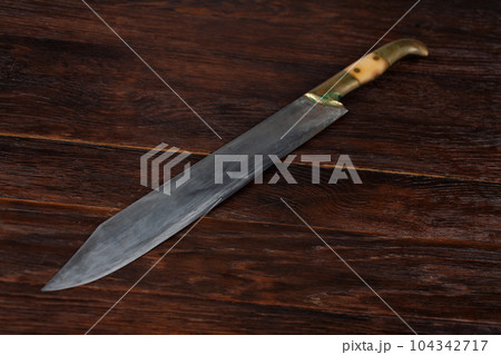 Retro vintage hunting knife Retro vintage hunting knife 104342717