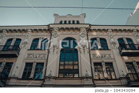 Morning Kharkiv city center building with panoramic windows photo. 104343094