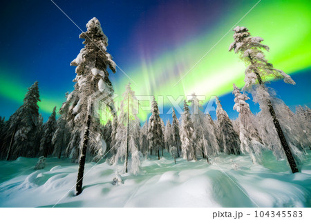 Witness the awe-inspiring dance of the northern lights in Lapland, Finland's Arctic paradise. Generative AI. 104345583