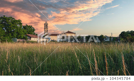 Landscape with bell tower Landscape with bell tower 104345784