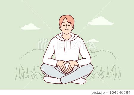 Man meditates sitting on grass and practices yoga to restore strength and put thoughts in order Man meditates sitting on grass and practices yoga to restore strength and put thoughts in order 104346594