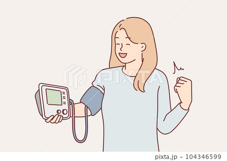 Woman with blood pressure monitor rejoices to see normalization of pulse and getting rid of disease Woman with blood pressure monitor rejoices to see normalization of pulse and getting rid of disease 104346599