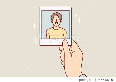 Photo of teenager boy in hand of father or mother for concept of nostalgia for times gone by 104346610