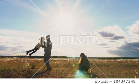 mother child father hug sunset, family happiness run, dream child girl running, mom dad hug sun, girls kid running, freedom concept, picnic park, concept girl daughter, healthy portrait walking mother child father hug sunset, family happiness run, dream child girl running, mom dad hug sun, girls kid running, freedom concept, picnic park, concept girl daughter, healthy portrait walking 104347249