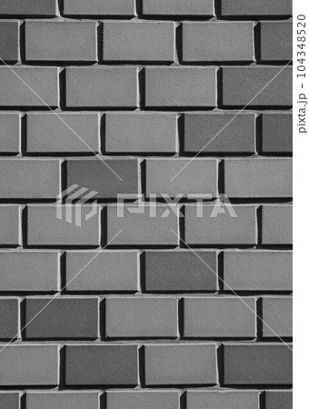 壁面レンガタイルモノクロ縦 104348520