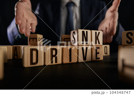 Drive or drink. The cubes form the words Drive - drink. The concept of choice, safe driving driving a car or not. 104348747