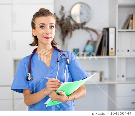 Cheefrul young woman therapist in office 104350444