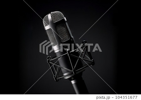 Sleek Elegance Professional Microphone on a Striking Black Background. created with Generative AI Sleek Elegance Professional Microphone on a Striking Black Background. created with Generative AI 104351677