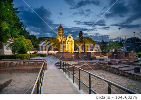 Standing Buddha image it time evening the landmark in Phitsanulok Province, Thailand. 104360278