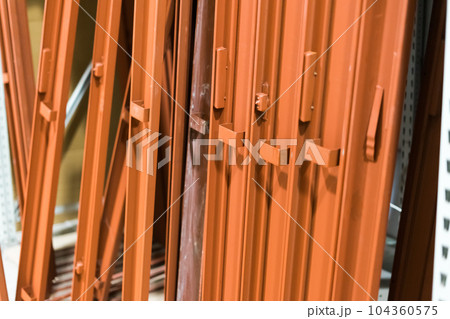 Interior red orange doors for sale in a specialized store 104360575