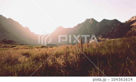mountainous desert landscape with rocky terrain and little vegetation mountainous desert landscape with rocky terrain and little vegetation 104361614