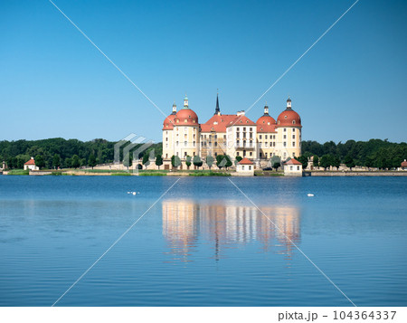 Panoramic view of the lake surrounding Moritzburg castle 104364337