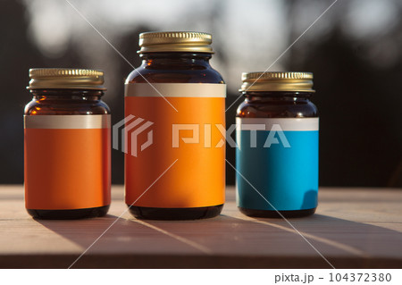 A set of pill cups, front view. Empty label. 104372380