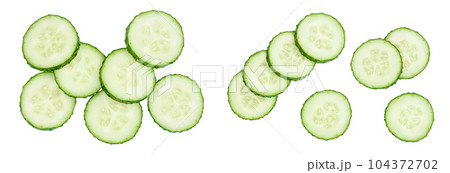 Sliced cucumber isolated on white background with full depth of field, Top view. Flat lay 104372702