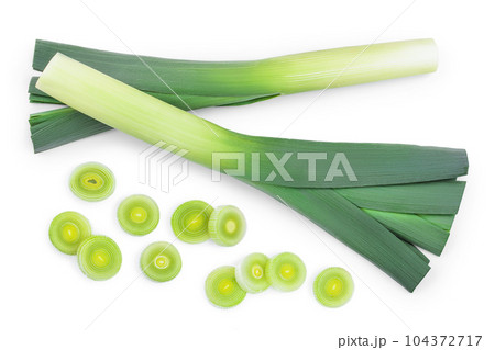 Leek vegetable closeup isolated on white background. Top view. Flat lay Leek vegetable closeup isolated on white background. Top view. Flat lay 104372717