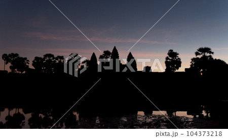 Outlines of the Angkor Temple and the surrounding area at dusk, Cambodian landscape. Outlines of the Angkor Temple and the surrounding area at dusk, Cambodian landscape. 104373218