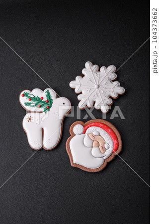 Beautiful Christmas or New Year colorful homemade gingerbread cookies Beautiful Christmas or New Year colorful homemade gingerbread cookies 104373662