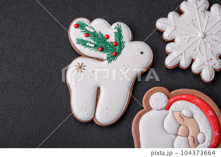 Beautiful Christmas or New Year colorful homemade gingerbread cookies 104373664