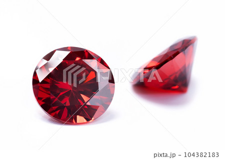 Red Ruby gemstone Round Cut isolate on white background, close up shot Red Ruby gemstone Round Cut isolate on white background, close up shot 104382183