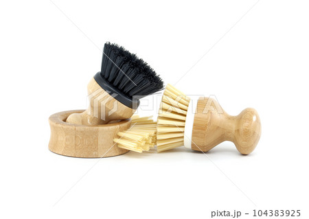 Close up dish brushes isolated on white background 104383925