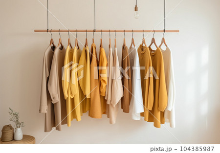 clothes hanging on the rail with Generative AI 104385987