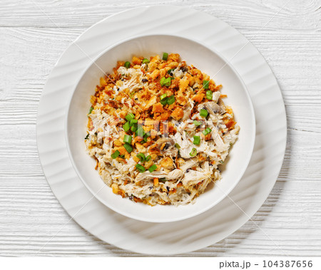 Chicken Rice Casserole in white bowl, top view Chicken Rice Casserole in white bowl, top view 104387656