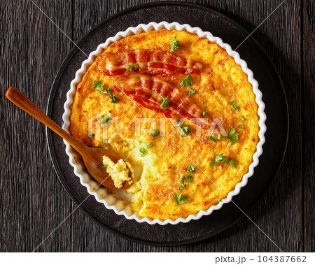 Cheddar Cheese Grits Casserole with bacon slices Cheddar Cheese Grits Casserole with bacon slices 104387662