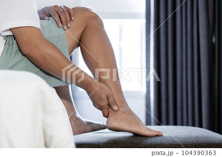 Problem of achilles tendon,middle aged man suffer from Achilles tendinitis,ligaments connecting calf muscles of leg to the heels injured,pain and stiffness in ankle bone or joints and sole of the foot Problem of achilles tendon,middle aged man suffer from Achilles tendinitis,ligaments connecting calf muscles of leg to the heels injured,pain and stiffness in ankle bone or joints and sole of the foot 104390363