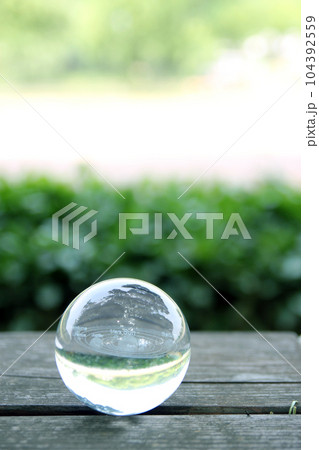 Nature photography of crystal ball with solar system in it, space, future environment and ESG concept 104392559
